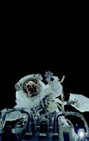 Space suits isolated on space background. Elements of this image furnished by NASA. photo