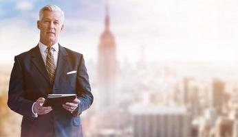 Portrait of smiling senior businessman photo