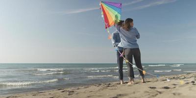 Couple enjoying time together at beach photo