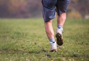 american football player exercises on ladder drills photo