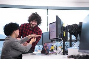 software developers couple writing programming code photo