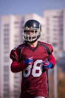 american football player in action photo