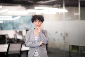 Portrait of successful female software developer photo