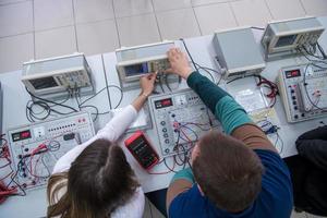 students doing practice in the electronic classroom top view photo