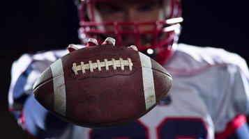 portrait of confident American football player photo