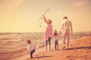 happy family enjoying vecation during autumn day photo