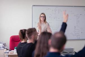 students doing practice in the electronic classroom photo