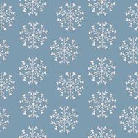 Seamless pattern with different snowflakes. Snow on a blue background. Vector illustration in flat style