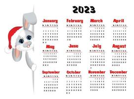 calendario 2023 con símbolo del año liebre o conejo. linda liebre o conejo sentado en un sombrero de navidad. la semana comienza el lunes. vector