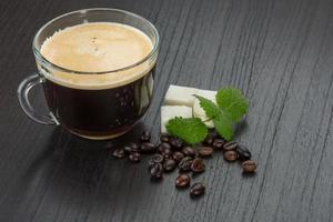 Espresso on wooden background photo