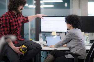 software developers couple writing programming code photo