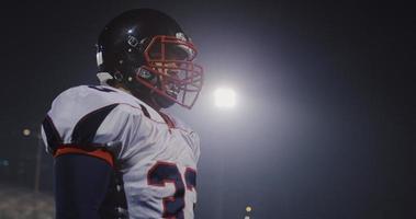 portrait of young confident American football player photo