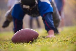 american football player in action photo