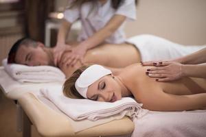 couple receiving a back massage photo