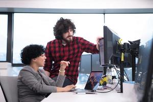 software developers couple writing programming code photo