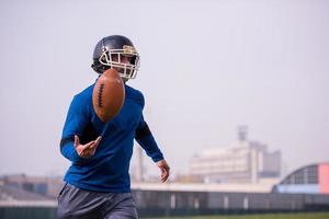 american football player in action photo