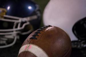 american football and helmets photo