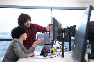 software developers couple writing programming code photo