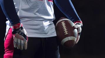 portrait of confident American football player photo