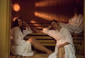 a group of young women in a sauna photo