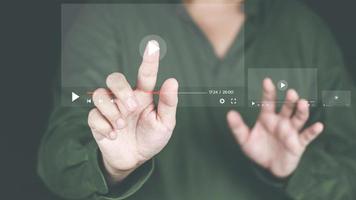 Concept of streaming online. Men's hands showing streaming screen. To represent the use of the Internet online. photo