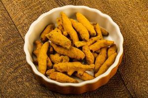 Tumeric roots dish photo
