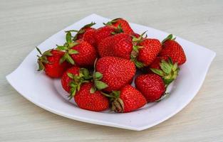 Strawberries on plate photo