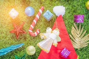 Top view Christmas decoration on green grass photo