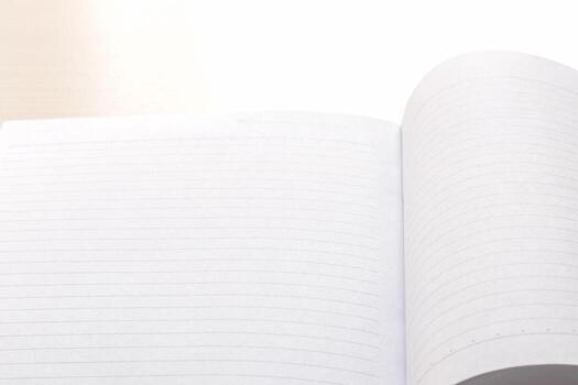 Open notebook with blank page photo