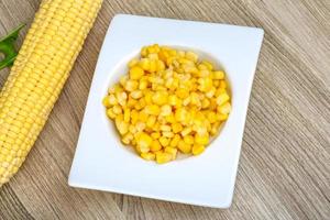 Sweet corn on wood photo