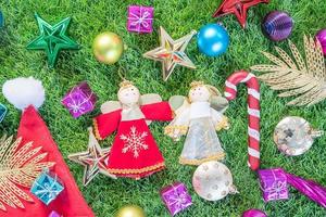 Top view Christmas decoration on green grass photo