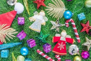 Top view Christmas decoration on green grass photo