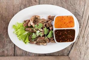 Top view Pig's intestines grilled thai style food photo