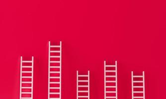 Ladder white collection with one overhanging on red wall studio background. leadership, success concept.3d rendering. photo