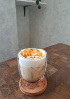 Glass of Ice Salted Caramel Macchiato. photo