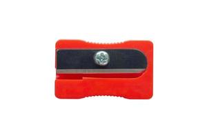 red plastic pencil sharpener isolated on white background top view photo