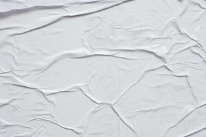 Blank white crumpled and creased paper poster texture background photo