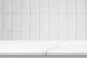 Empty white marble table top with blur tile wall bathroom background photo