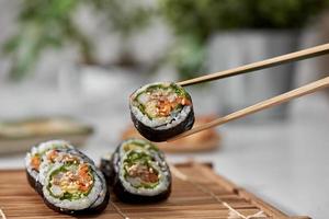 Korean roll Gimbap kimbob made from steamed white rice bap and various other ingredients photo