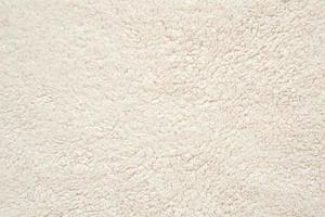 White fluffy fur fabric wool texture background photo