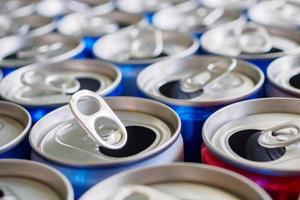 Empty aluminium drink cans recycling background concept photo