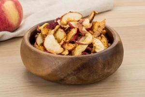 Apple chips on plate photo