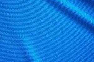 Camiseta de fútbol azul ropa textura de tela ropa deportiva fondo, vista superior de primer plano foto