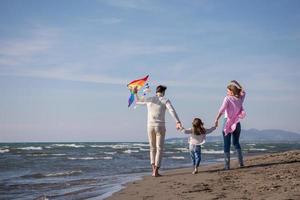 happy family enjoying vecation during autumn day photo