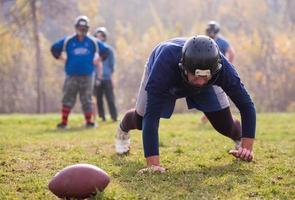 american football player in action photo