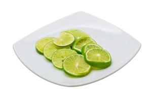 Sliced lime on white photo