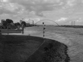 The city of Nijmegen at the river waal in the netherlands photo