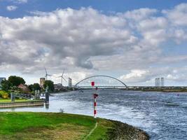 The city of Nijmegen at the river waal in the netherlands photo