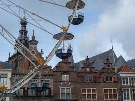 The city of Nijmegen at the river waal in the netherlands photo