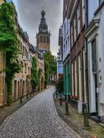 The city of Nijmegen at the river waal in the netherlands photo